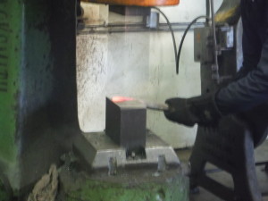 Blacksmith at the hammer